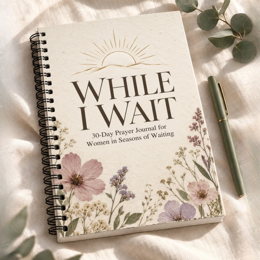 While I Wait: 30-Day Prayer Journal for Women in Seasons of Waiting, spiral-bound with wildflower cover, green pen and eucalyptus