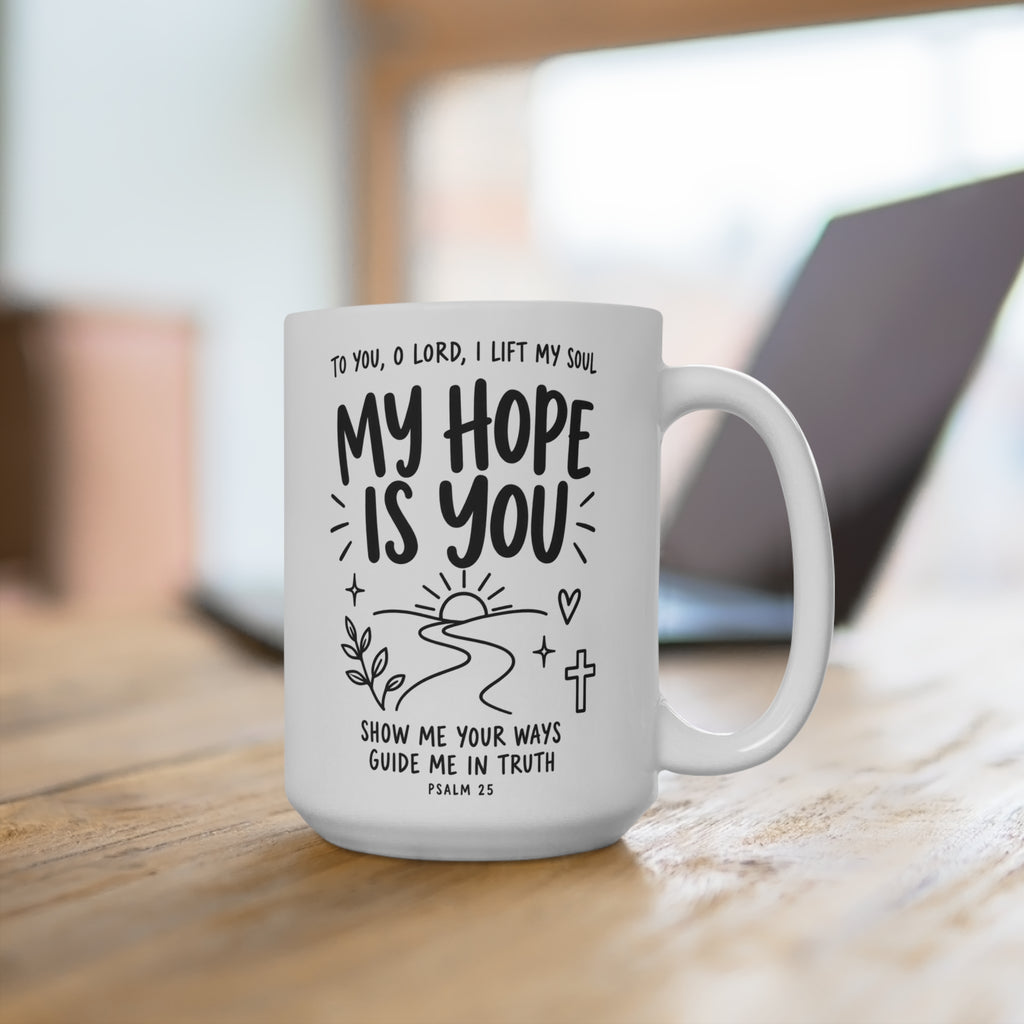 My Hope Is You Psalm 25 mug on a desk