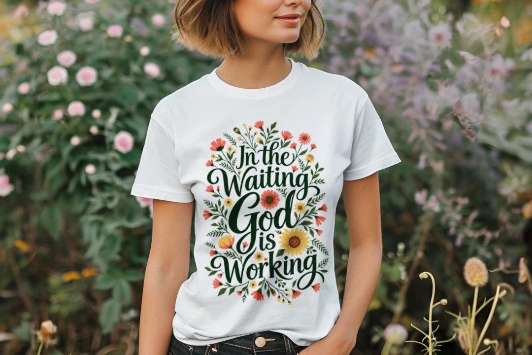 Close-up of the In the Waiting, God Is Working floral tee in white