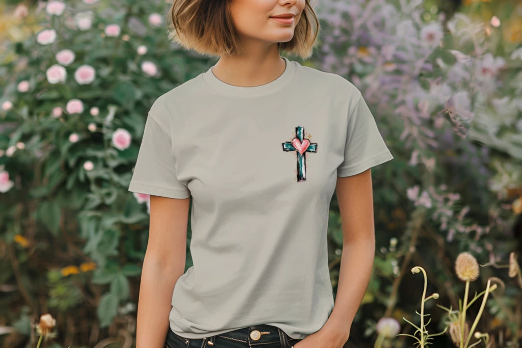 Woman wearing the Sand Look Back & Thank God tee with small front cross