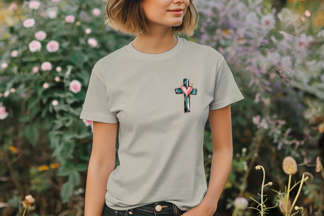 Woman wearing the Sand Look Back & Thank God tee with small front cross