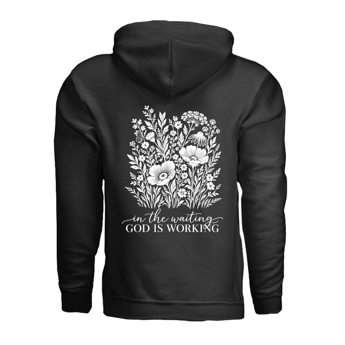In the Waiting, God Is Working floral hoodie in Black, back view with the full wildflower and message design